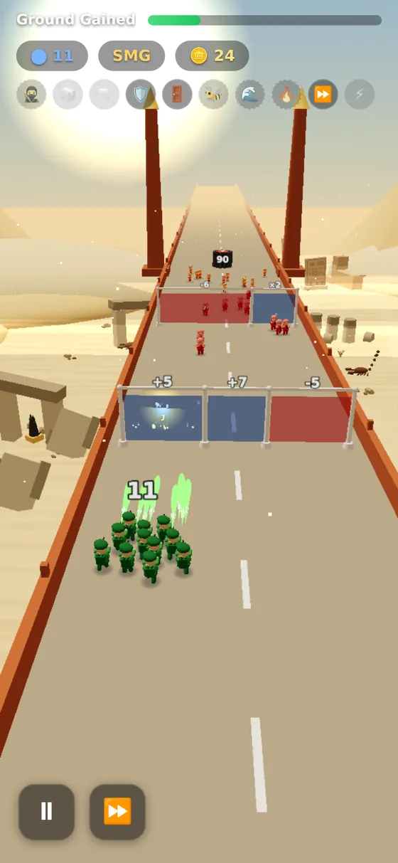 A desert bridge with three gates side by side, marked +5, +7 and −5, and a green squad walking towards them.
